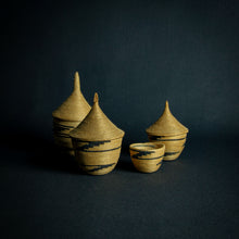 Load image into Gallery viewer, Set of African woven baskets resembling huts, the smallest without a lid.