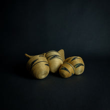 Load image into Gallery viewer, Set of African woven baskets resembling huts, the smallest without a lid.