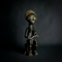 Load image into Gallery viewer, Intricately carved Ashanti Maternity figure, symbolizing fertility and traditional Ashanti motherhood, set against a dark backdrop.