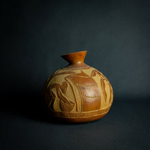 Load image into Gallery viewer, Artisanal calabash vase engraved with scenes of African daily life, highlighting the rich cultural tapestry and community spirit.