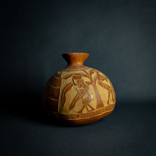 Load image into Gallery viewer, Artisanal calabash vase engraved with scenes of African daily life, highlighting the rich cultural tapestry and community spirit.