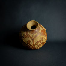 Load image into Gallery viewer, Artisanal calabash vase engraved with scenes of African daily life, highlighting the rich cultural tapestry and community spirit.