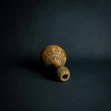 Load image into Gallery viewer, Intricately designed Dogon calabash, featuring traditional geometric patterns and cultural symbols, set against a dark background.