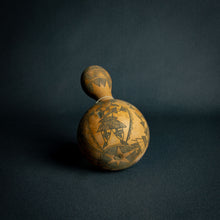 Load image into Gallery viewer, Intricately designed Dogon calabash, featuring traditional geometric patterns and cultural symbols, set against a dark background.