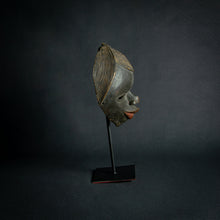 Load image into Gallery viewer, Vintage Dan tribal masks, one female and one male, showcasing the traditional craftsmanship of the Dan people from West Africa.