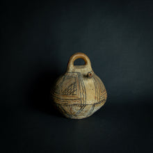 Load image into Gallery viewer, Handcrafted African earthenware vessel with traditional geometric patterns, symbolizing the artistry and heritage of African pottery.