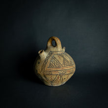 Load image into Gallery viewer, Handcrafted African earthenware vessel with traditional geometric patterns, symbolizing the artistry and heritage of African pottery.