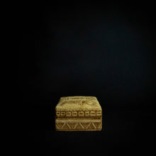 Load image into Gallery viewer, Beautiful box made of animal skin with intricate designs inspired by Senufo masks and animals. The box is adorned with rich patterns and textures, and has a unique and rustic feel. It can be used for storage or as a decorative piece in any home.