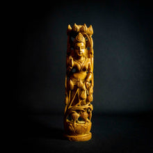 Load image into Gallery viewer, Hand-carved sandalwood statue of Hindu Goddess Lakshmi, adorned with lotus flowers.