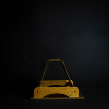 Load image into Gallery viewer, A vintage disc holder made of wood, with a capacity to hold 25 records. The holder has two handles for easy carrying and a simple yet stylish design that fits in with any room decor.