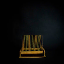 Load image into Gallery viewer, A vintage disc holder made of wood, with a capacity to hold 25 records. The holder has two handles for easy carrying and a simple yet stylish design that fits in with any room decor.