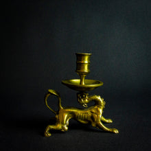 Load image into Gallery viewer, Dragon-themed chandelier made of bronze or brass, with intricate scales and facial features. Tail serves as a handle. Perfect for lovers of fantasy and mythology.