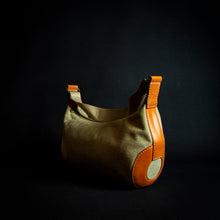 Load image into Gallery viewer, Limited edition "Roland Garros" Lancel handbag with a unique "baguette" shape, perfect for collectors of rare handbags and tennis enthusiasts.