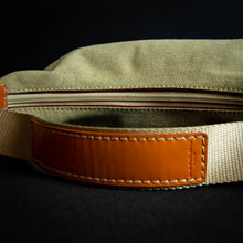 Load image into Gallery viewer, Limited edition "Roland Garros" Lancel handbag with a unique "baguette" shape, perfect for collectors of rare handbags and tennis enthusiasts.