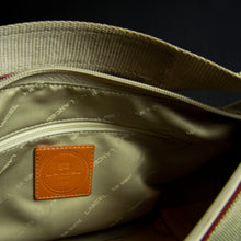 Load image into Gallery viewer, Limited edition "Roland Garros" Lancel handbag with a unique "baguette" shape, perfect for collectors of rare handbags and tennis enthusiasts.