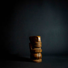 Load image into Gallery viewer, This wooden statue is a true masterpiece, inspired by the Tiki tribe and boasting intricate details and craftsmanship. Made of high-quality wood, it is both sturdy and elegant, with a unique shape and beautiful finish that make it a standout piece in any room. A must-have for art enthusiasts and collectors alike.