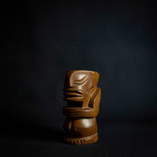Load image into Gallery viewer, This wooden statue is a true masterpiece, inspired by the Tiki tribe and boasting intricate details and craftsmanship. Made of high-quality wood, it is both sturdy and elegant, with a unique shape and beautiful finish that make it a standout piece in any room. A must-have for art enthusiasts and collectors alike.