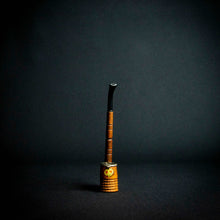 Load image into Gallery viewer, A wooden pipe with a German-style design and flower decoration on the stove, featuring a metal cover with a secure closure.