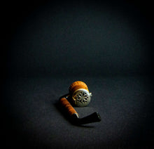 Load image into Gallery viewer, A wooden pipe with a German-style design and flower decoration on the stove, featuring a metal cover with a secure closure.