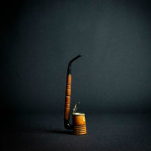 Load image into Gallery viewer, A wooden pipe with a German-style design and flower decoration on the stove, featuring a metal cover with a secure closure.