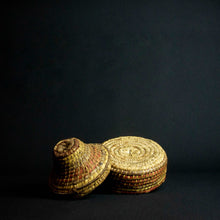 Load image into Gallery viewer, Handmade African raffia box adorned with colorful patterns and designs, perfect for storing small items or as a decorative accent piece.