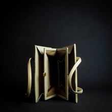 Load image into Gallery viewer, Stylish and functional beige handbag made from high-quality material that mimics the look of snakeskin, featuring multiple pockets inside and a spacious interior. Perfect for any occasion.