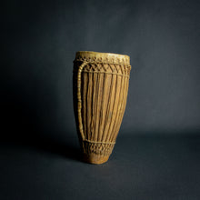 Load image into Gallery viewer, Traditional African hand drum with a tapered wooden body, intricate ropework, and a weathered hide head, evoking the spirit of African music.
