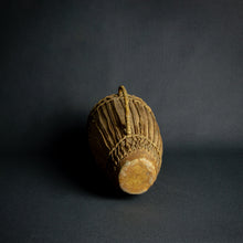 Load image into Gallery viewer, Traditional African hand drum with a tapered wooden body, intricate ropework, and a weathered hide head, evoking the spirit of African music.
