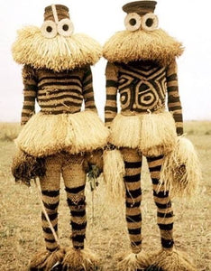 Ethnographic doll representing the Pende Munganji spirit dancers of Zaire, made of handcrafted wood and raffia material.