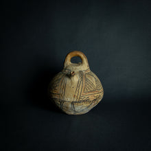 Load image into Gallery viewer, Handcrafted African earthenware vessel with traditional geometric patterns, symbolizing the artistry and heritage of African pottery.
