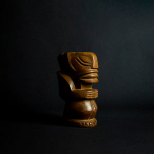 This wooden statue is a true masterpiece, inspired by the Tiki tribe and boasting intricate details and craftsmanship. Made of high-quality wood, it is both sturdy and elegant, with a unique shape and beautiful finish that make it a standout piece in any room. A must-have for art enthusiasts and collectors alike.