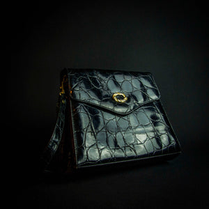 Vintage black crocodile-look handbag with gold buckle