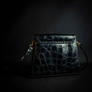 Vintage black crocodile-look handbag with gold buckle