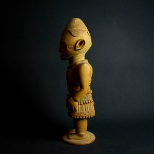 Intricately crafted Kuba statue showcasing the skilled craftsmanship and diverse artistic creations of the Kuba people.