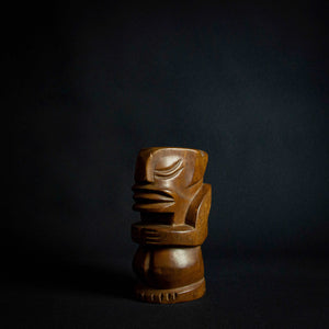 This wooden statue is a true masterpiece, inspired by the Tiki tribe and boasting intricate details and craftsmanship. Made of high-quality wood, it is both sturdy and elegant, with a unique shape and beautiful finish that make it a standout piece in any room. A must-have for art enthusiasts and collectors alike.