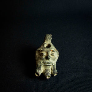 Terracotta Oil Lamp in Roman Style with Decorative Medallion featuring man's face and three spouts.