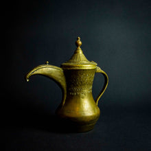 Load image into Gallery viewer, Antique Islamic teapot made of brass and copper with intricate designs and engravings on the exterior.
